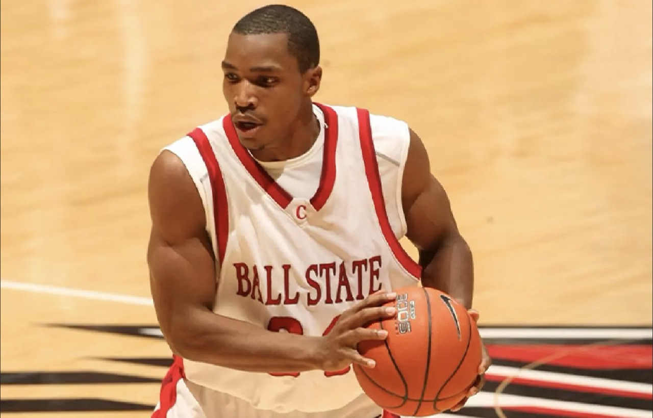 Skip Mills holds basketball in preparation of a shot whilst in a Ball State Basketball game in 2006. 